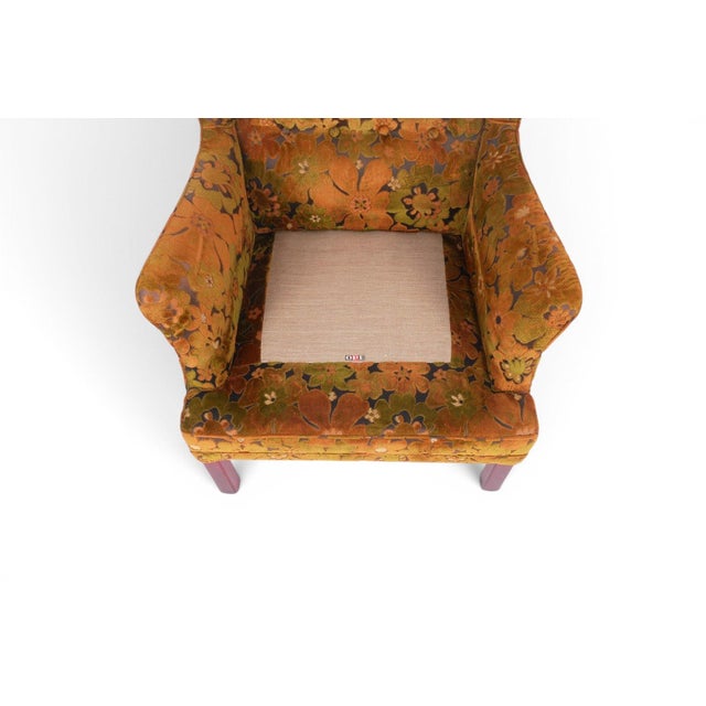 A wonderfully original pair of 1960s Swedish wingback lounge chairs by OPE Møbler, retaining their factory-original floral...