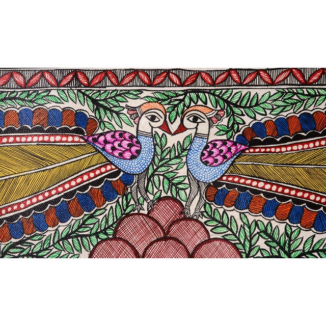 Bring the beauty of traditional Indian folk art into your home with this exquisite hand-painted Madhubani painting by...