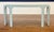 This is the Martin Console Table by Highland House. It has a contemporary design with a light blue color. We estimate it...