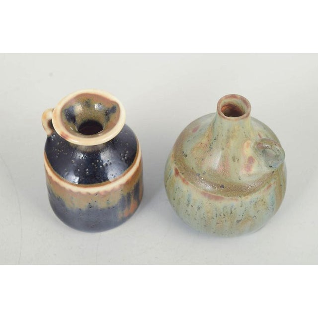 Carl-Harry Stålhane for Rörstrand Two Miniature Vases, Mid-20th Century. Two small hand-glazed stoneware miniature vases,...