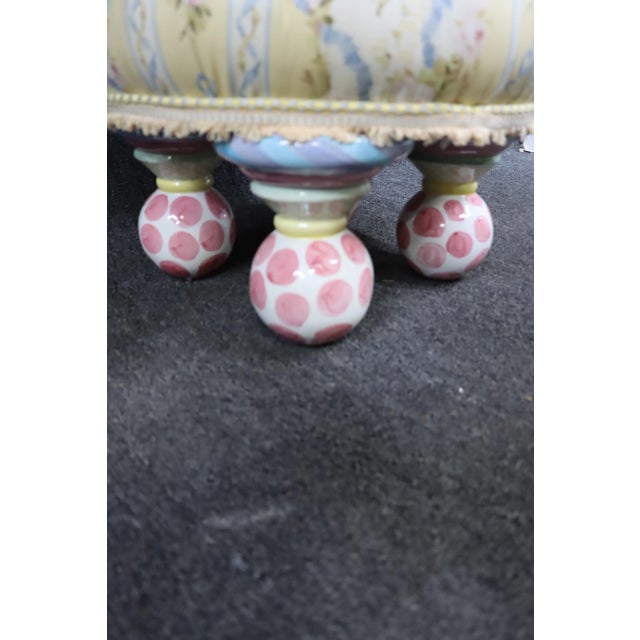Mackenzie Childs Tufted Upholstered Footstool, floral and bow tufted upholstered seat, on paint decorated pottery feet.
