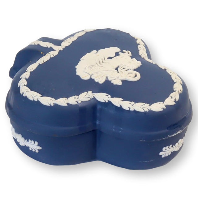 Wedgwood trinket box with raised detailed Roman pattern. Maker's mark on underside.