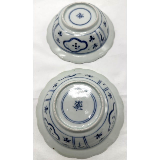 Rare Pair of 18th Century Chinese Export Blue and White Scalloped Bowls Long Eliza Motif This matched pair of 18th century...