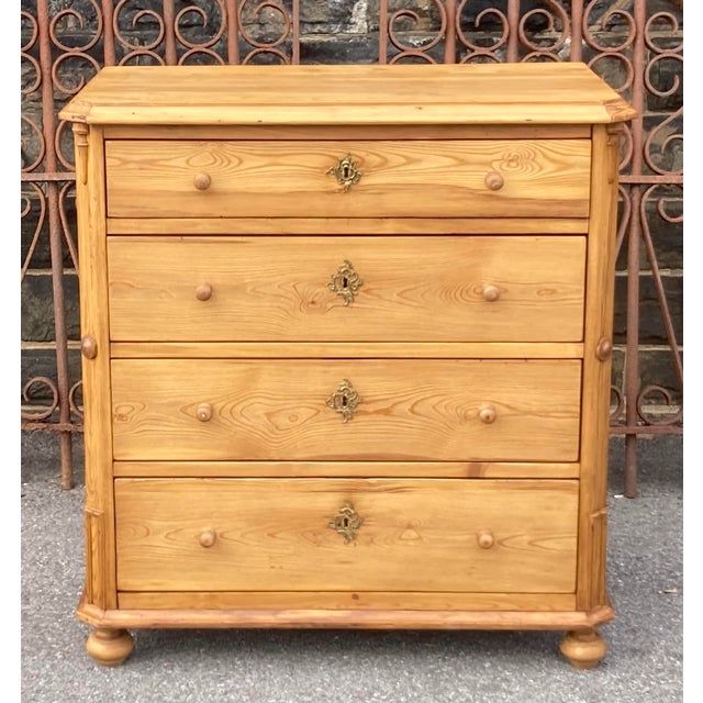 This lovely little chest of drawers has a beautiful light honey color and an even grain pattern, which give it...