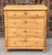 This lovely little chest of drawers has a beautiful light honey color and an even grain pattern, which give it...