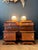 Pair of lamps, each with a pink alabaster base with a push button and a cut glass globe. 1960s. In excellent condition....