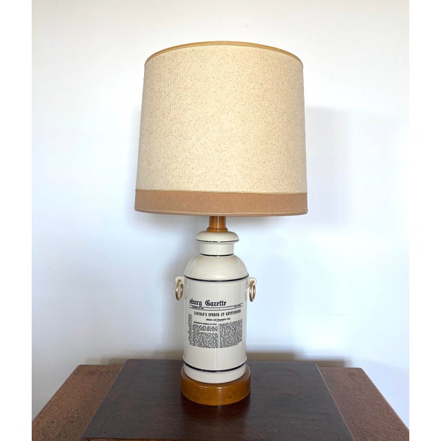 This Mid-Century Forslund Gettysburg Address Lamp is an amazing find. Crafted with ceramic and maple wood base and neck,...