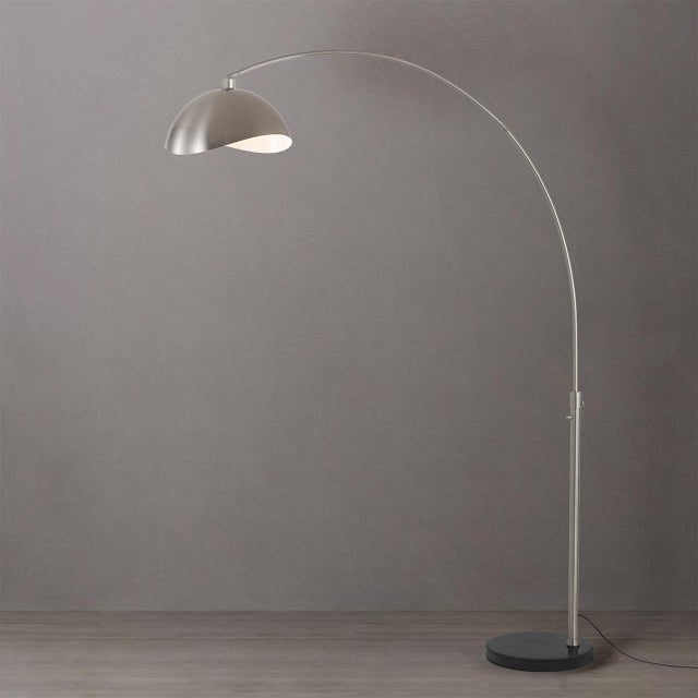 The Luna Bella Arc Lamp is a modern lighting masterpiece in NOVA's collection, featuring a sleek satin nickel finish and a...
