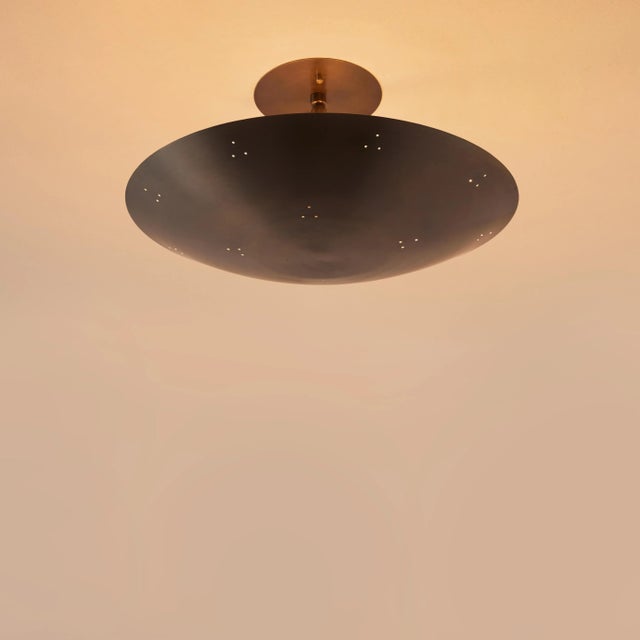 Raul Reyes 'Rey 14' Perforated Patinated Brass Dome Ceiling Lamp. Hand-fabricated in Los Angeles, these highly refined...