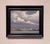 Sloan's Lake captures a tranquil urban landscape at dusk, where the soft hues of the sky blend seamlessly with the...