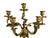 A pair of gilt bronze and brass Rococo candlesticks, each rising to five lights. The shaft of each piece is richly...