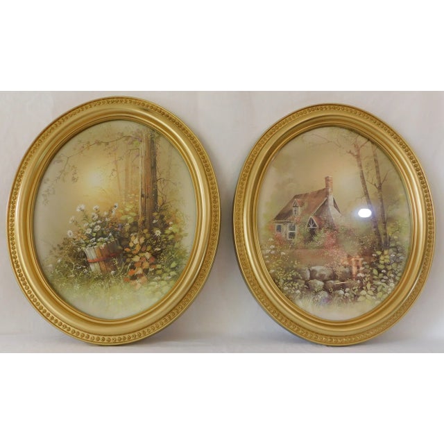 Amazing pair of large vintage circa 1970s oval syroco framed wall pictures. Large gold oval syroco frames with rose...