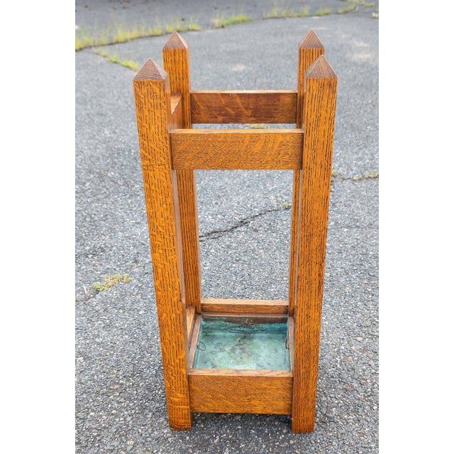 We are selling this nice simple Arts + Crafts Mission oak piece. This piece would be used for Umbrellas or canes. It is...