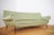 Curved Gigi Radice Sofa, 1950s – Iconic Italian Mid-Century Design Experience the allure of Italian mid-century elegance...