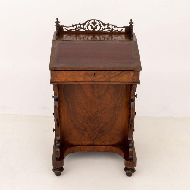 Victorian Burl Walnut Davenport Desk, 19th century, the slant from burgundy leather lift top opening to storage...