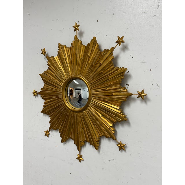 Design Plus Gallery presents a Starburst Mirror by Carol Canner for Carvers’ Guild. A striking mirror interpretation of...