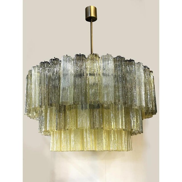 Scenographic italian hand-made chandelier with multicolored “tronchi”, elements of murano glass. huge chandelier in...