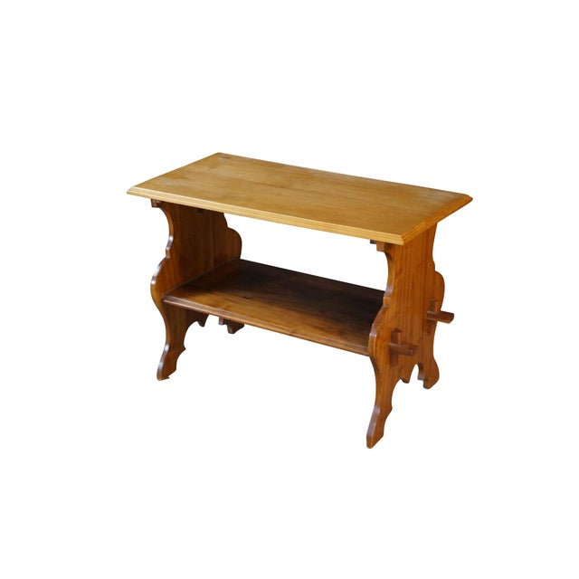 Crafted from solid mahogany wood, this vintage two-tier trestle table showcases a beautiful vertical grain pattern, fine...