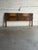 This commanding king-size bed piece showcases the bold architectural texture and geometric relief synonymous with the...