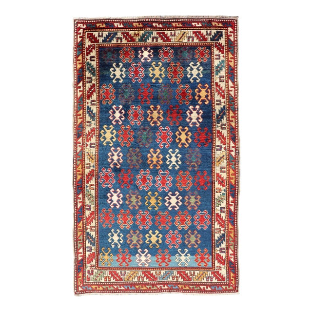 Antique Caucasian Kazak Rug With Geometric and Tribal Motifs 4'3" X7'6" For Sale