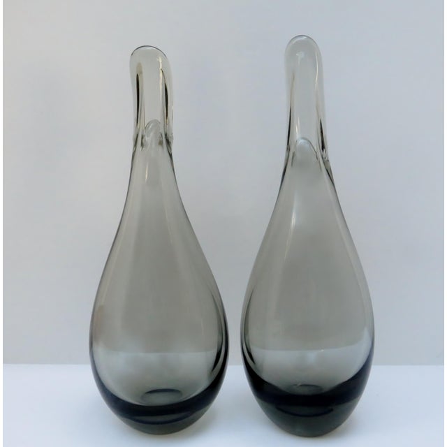 A pair of vintage Per Lütken for Holmegaard smoke blown glass vases. They have charmingly been nicknamed ducklings. Lütken...
