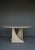 A 1970s hand built circular pine dining table. Possibly a prototype or a personal project. Made out of one sheet of solid...