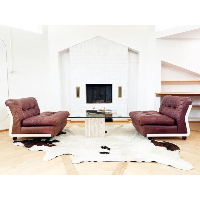 Very hot version of the original C&B 1970s Mario Bellini Amanta Chair. Iconic. In brown leather with the white frame, on...