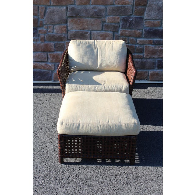 The McGuire Furniture Company is located in San Francisco and produces exceptional pieces like this armchair and ottoman...