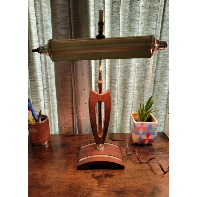 Add a touch of mid-century charm to your living space with this beautiful Mid Century Modern (MCM) Wood & Brass Desk/Piano...