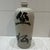 Vintage ceramic Japanese Saki bottle hand thrown with a light grey glaze. The calligraphy on both sides are hand drawn in...