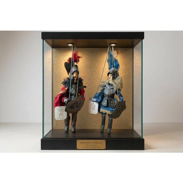 A splendid pair of period Sicilian puppets, depicting the legendary protagonists of the Carolingian cycle: the valiant...