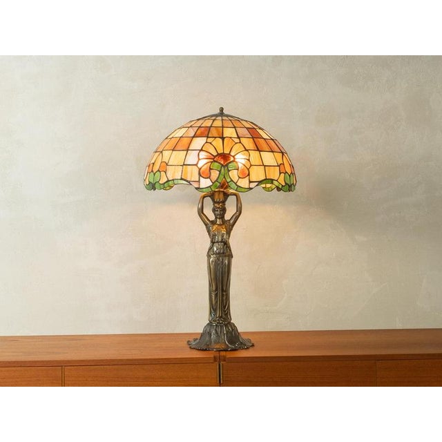 Art Nouveau Tiffany table lamp Width: 50 cm Height: 80 cm Depth: 50 cm This piece has been carefully cleaned and is in...