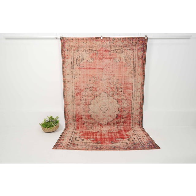 Vintage Hand-Knotted runner rug is a semi-antique vintage area rug. The '70s Eastern region of Anatolia's unique rug is...