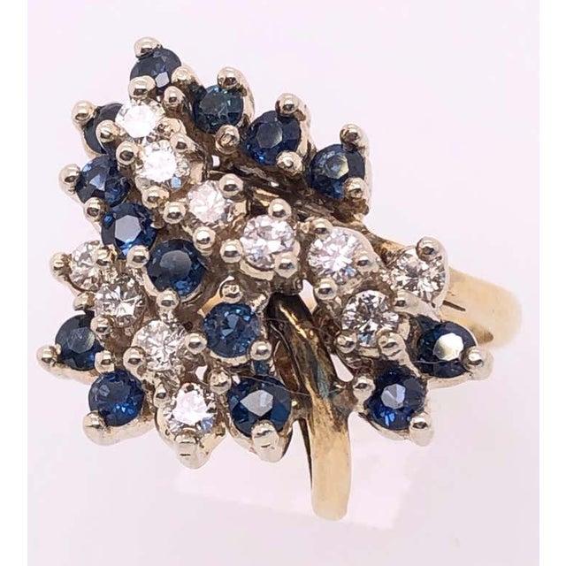 Modern 14 Karat Yellow Gold Ring With Sapphire and Diamond Cluster For Sale - Image 3 of 12