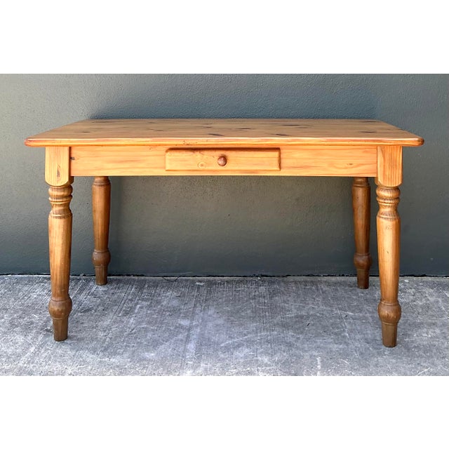This charming vintage farm table embodies the honest simplicity and warmth of traditional farmhouse design. Expertly...