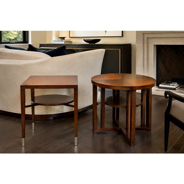 A sophisticated set of two coordinating side tables by Bolier & Company for Decca Home, representing the Kata and Atelier...