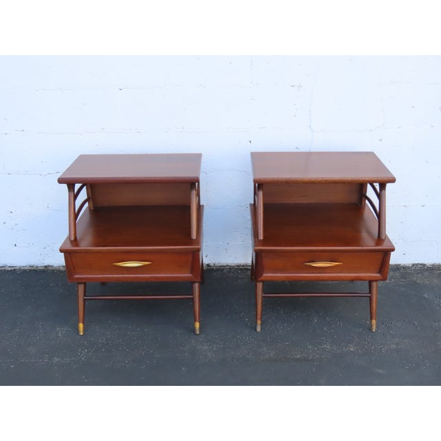 This magnificent Pair of Nightstands is made of wood, walnut, veneer, and metal. They were made by Kent Coffey, and they...