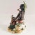 Statue in ceramics; Bassano porcelain early 1900s featuring boy with umbrella. This piece has an attribution mark, I am...