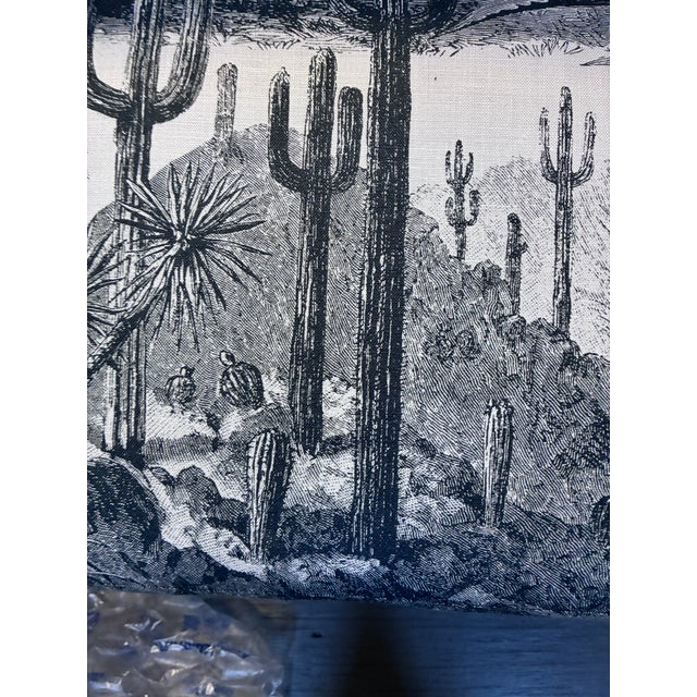 Pierre Frey's dramatic fabric of The American West desert is the standout of this stunning bench. 'Tampa Noir" depicts...