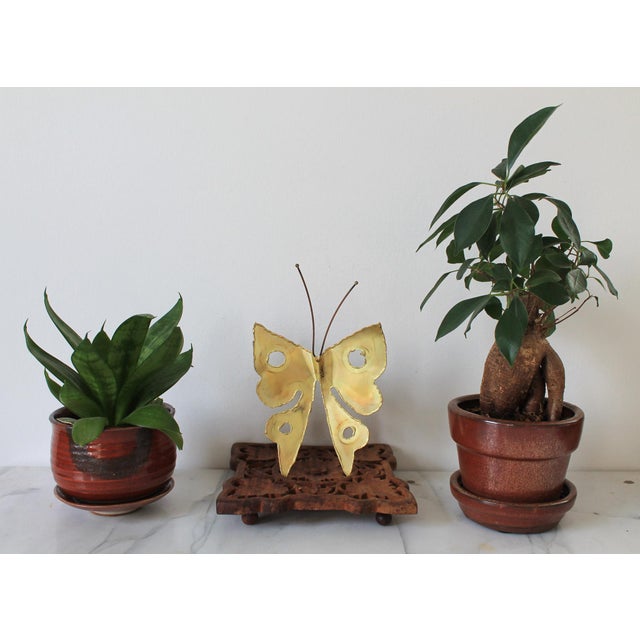 Mid-century brutalist brass butterfly wall hanging. Signed "Nelson". Minor age wear. Ready to hang.