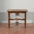 Small low table with cross and carved side bands made of solid italian wood from the early 1900s measurements 73.5 x 49 x...