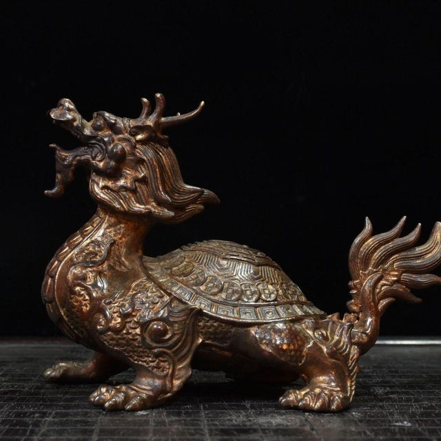 This is an impressive antique bronze sculpture of a Dragon Turtle, a mythical creature revered in traditional Asian...