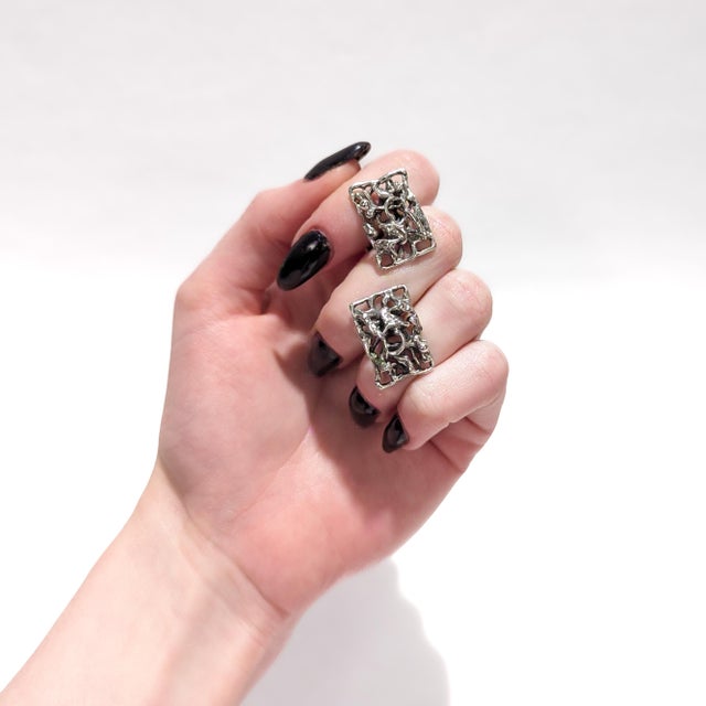 A fine pair of signed Danish Modern cufflinks. In sterling silver. By Aage Weimar of Copenhagen, Denmark. Of rectangular...