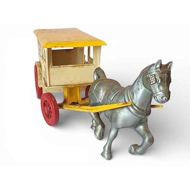 vintage Wyandotte 1950s Sunshine Dairy milk and cream horse-drawn plastic toy wagon. 8 inches long. Horse sits a bit...