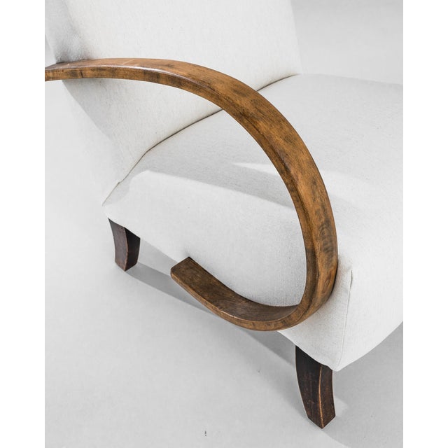 Discover the timeless elegance of this 1930s Czech Wooden Armchair, a masterpiece crafted by the renowned designer J....