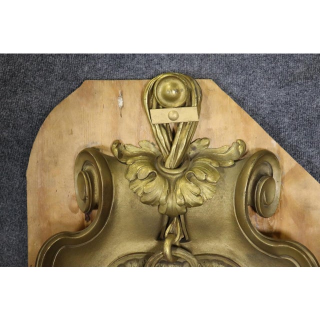 Elevate your interior décor with this magnificent Early 19th Century Palace Size French 5 Arm Pair of Sconces, a statement...