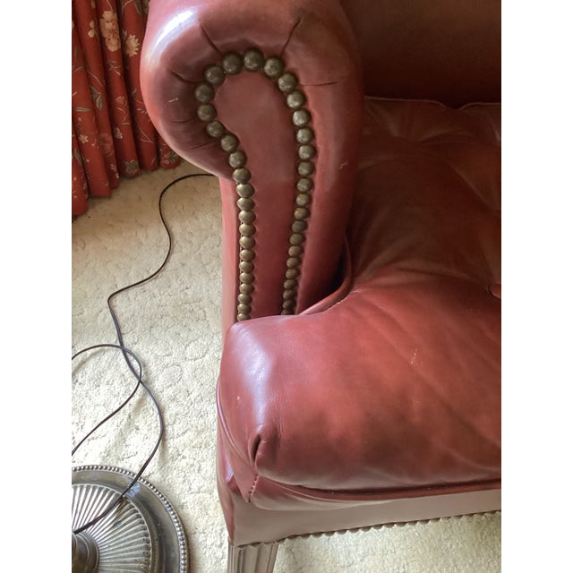 This comfortable soft full grain leather Armchair/Ottoman set with its neat nailhead trim has been in our family since our...