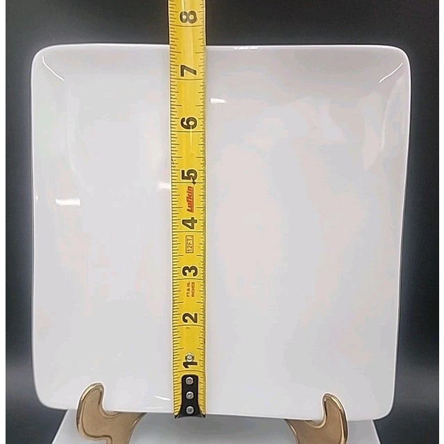 Elevate your table setting with this Set of 8 Crate & Barrel White Square Salad Plates, crafted in Portugal. Featuring a...