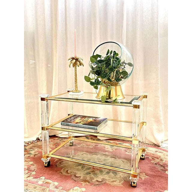 Astonishing three tier tea cart from the 70’s attributed to Charles Hollis Jones’ distinct style. Comfortable and...