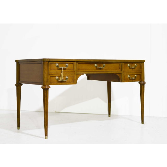 Classic Louis-style lines meet a clean, tailored finish in this 1970s writing desk or vanity. The black leather top adds...